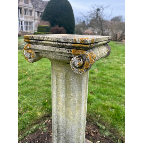 478 - A COMPOSITE STONE PLINTH

the square top over an ionic capital, fluted columns to stepped base, 100c... 