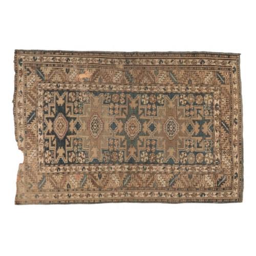 61 - A BOKHARA RUG

with a brick red field containing three rows of guhls within multiple foliate borders... 