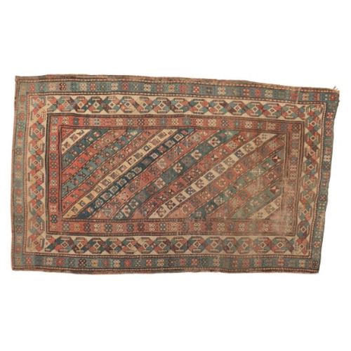 62 - A CAUCASIAN RUG

of bold geometric design, the rectangular field with triangular stripes containing ... 