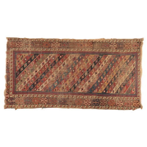 62 - A CAUCASIAN RUG

of bold geometric design, the rectangular field with triangular stripes containing ... 