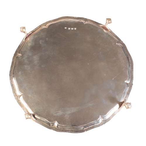 94 - A GEORGE III OCTAGONAL SILVER SALVER

by John Carter, London 1774, with a beaded edge and engraved w... 