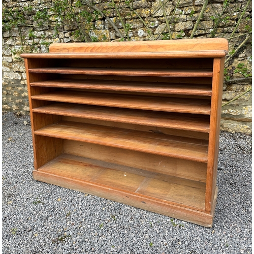 469 - A PINE DRESSER

20th century, the upper section with moulded cornice over shelves, plate dividers, a... 