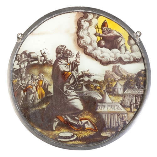 81 - A FLEMISH STAINED GLASS ROUNDEL probably 16th century, of Moses praying on Mt. Sinai, with God appea... 