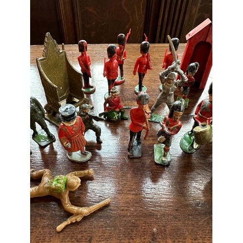 422c - A COLLECTION OF BRITAINS AND OTHER PAINTED LEAD AND METAL SOLDIERS a Britains painted lead coronatio... 