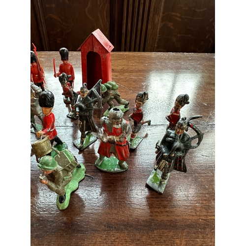 422c - A COLLECTION OF BRITAINS AND OTHER PAINTED LEAD AND METAL SOLDIERS a Britains painted lead coronatio... 