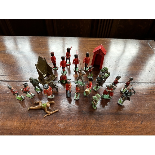 422c - A COLLECTION OF BRITAINS AND OTHER PAINTED LEAD AND METAL SOLDIERS a Britains painted lead coronatio... 