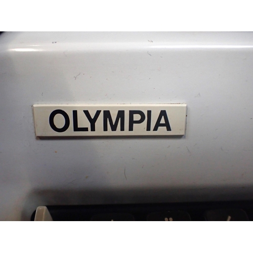 118 - A WEST GERMAN 'OLYMPIA' TYPEWRITER in carrying case