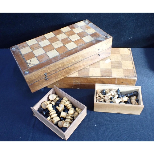 131 - A 19TH CENTURY BOXWOOD CHESS SET one other boxwood chest set, together with two inlaid chess boards ... 