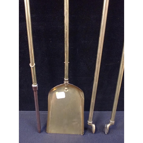 146 - A SET OF BRASS FIRE IRONS shovel, poker and tongs