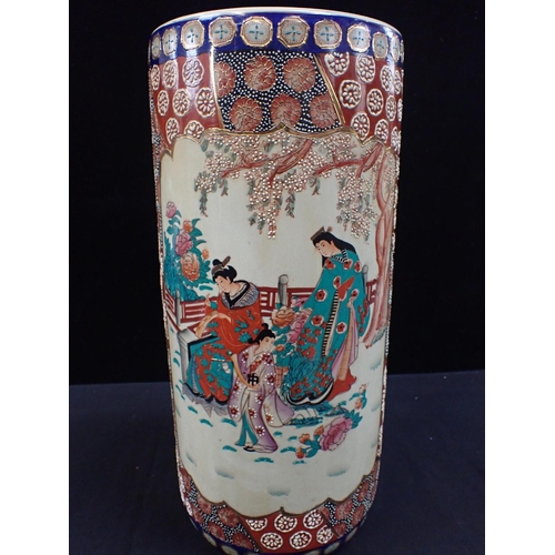 148 - A CHINESE CYLINDRICAL STICK STAND decorated with figures within patterned borders 46cm high