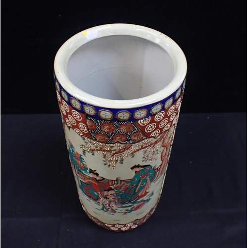 148 - A CHINESE CYLINDRICAL STICK STAND decorated with figures within patterned borders 46cm high