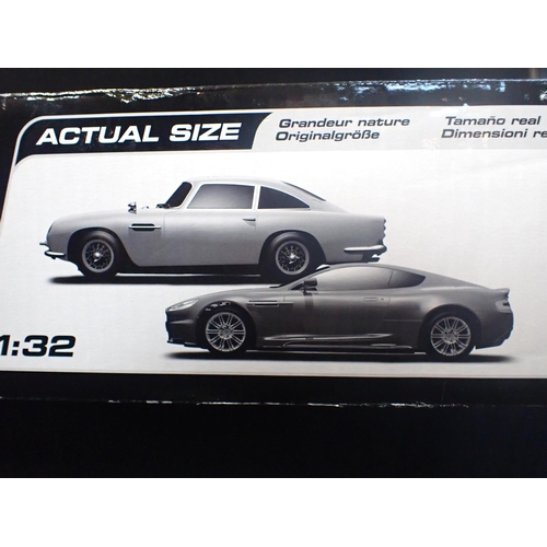 198 - SCALEXTRIC JAMES BOND 007 CASINO ROYALE / GOLDFINGER SET complete and boxed, comprising of Aston Mar... 