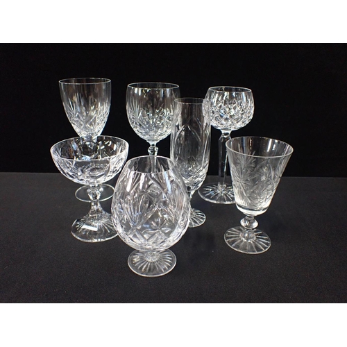 21 - A COLLECTION OF TABLE GLASS mostly cut glass, various styles and sizes