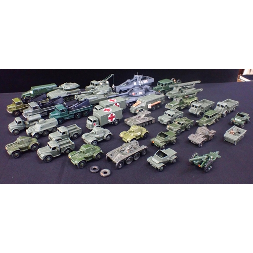 213 - A COLLECTION OF DINKY UNBOXED MILITARY VEHICLES consisting of 36 vehicles including, tanks and truck... 