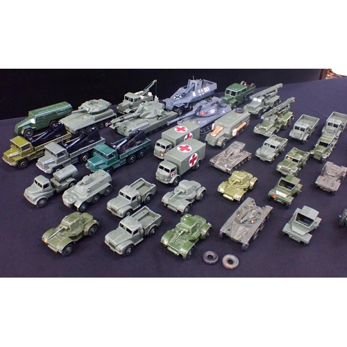 213 - A COLLECTION OF DINKY UNBOXED MILITARY VEHICLES consisting of 36 vehicles including, tanks and truck... 