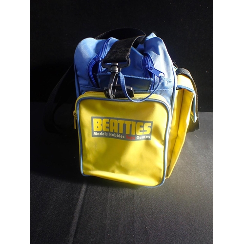 222 - A SCALEXTRIX BRANDED KIT BAG issued by Beatties models, containing mixed loose Scalextrix track