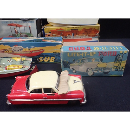 238 - A WELSOTOYS No 189 SUB CHASER TOY BOAT (boxed), a Japanese Ichico (alps) Lite-up Ford (boxed), a Kle... 