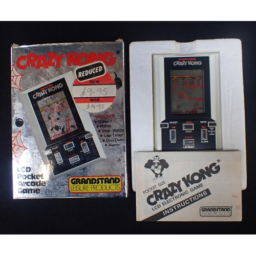 255 - GRANDSTAND LEISURE PRODUCTS 'CRAZY KONG' 1982 LCD electronic game, boxed with instructions, and 'Poc... 