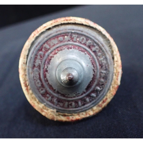 264 - A FRENCH BISQUE HEADED 'TOUPIE' SPINNING TOP DOLL the tin base stamped 'TOUPIE BREVETTE' (obscured),... 