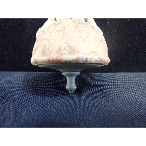 264 - A FRENCH BISQUE HEADED 'TOUPIE' SPINNING TOP DOLL the tin base stamped 'TOUPIE BREVETTE' (obscured),... 