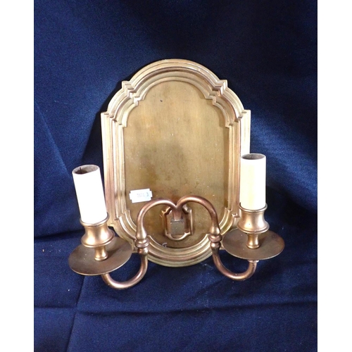 276 - A SET OF FOUR GILT BRASS WALL SCONCES two-branch, the shaped backplates 23.5cm high