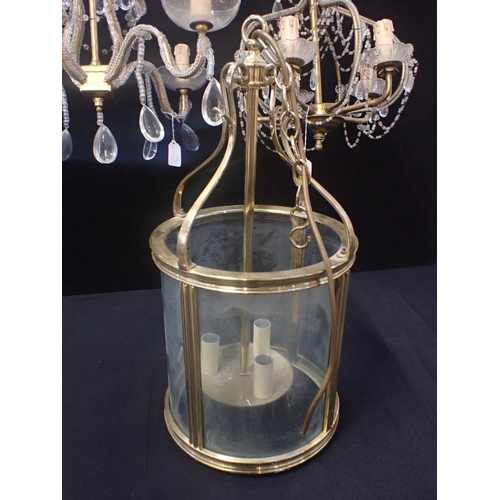 290 - A BRASS-FRAMED HALL LANTERN of cylindrical form,52cm high, 26cm dia, and two beaded chandeliers (one... 