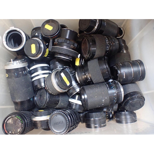 329 - A QUANTITY OF CAMERA LENSES various makes, and a camera case