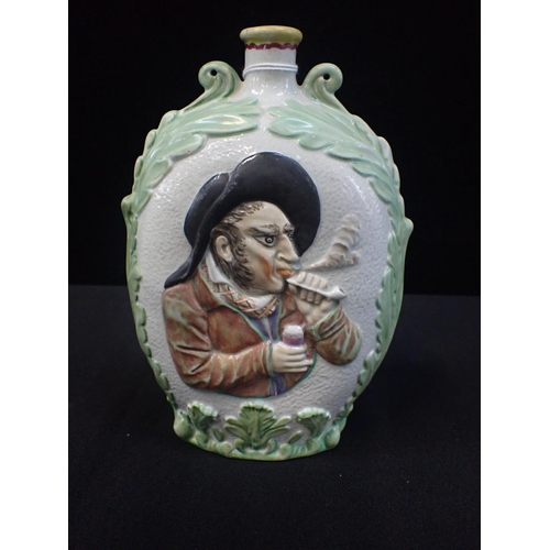 349 - A PEARLWARE MOULDED FLASK decorated in relief with busts of men smoking, with acanthus borders 20cm ... 