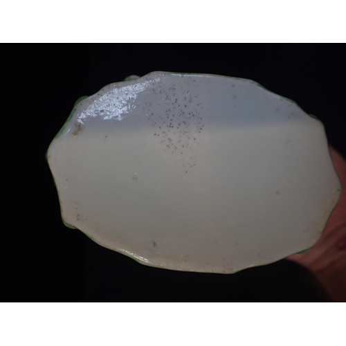 349 - A PEARLWARE MOULDED FLASK decorated in relief with busts of men smoking, with acanthus borders 20cm ... 