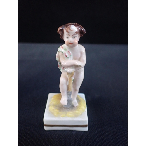 355 - EARLY 19th CENTURY STAFFORDSHIRE GRIEVING GIRL FIGURE c.1805, 6.5 cms long, with two other figures, ... 