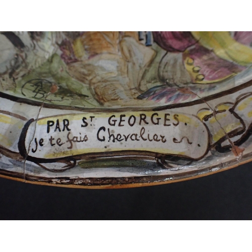 368 - A FAEINCE DISH, SIGNED 'ALB', PAINTED WITH A SCENE and inscribed 'PAR St GEORGES. Je te fais Chevali... 