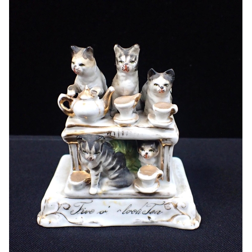 375 - A FAIRING DEPICTING A CATS' TEA PARTY with other ceramic cats