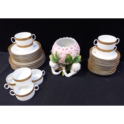 37a - THOMAS, GERMANY; A RETRO PART DINNER SERVICE with decorative border, and a Meissen style centrepiece... 