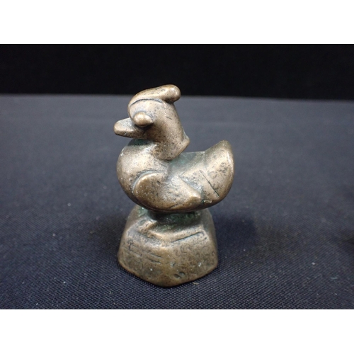 398 - THREE EASTERN GRADUATED BRONZE OPIUM WEIGHTS modelled as chickens, together with one other modelled ... 