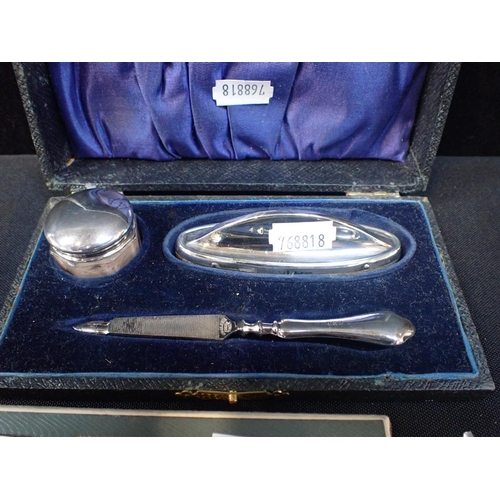 444 - A BOXED GEORGE V JUBILEE SPOON AND A BOXED MINATURE ANNOINTING SPOON with other silver