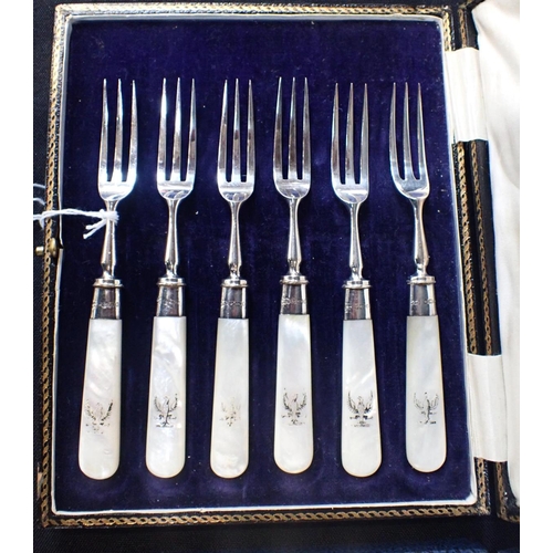 454 - A SET OF SIX SILVER FRUIT KNIVES AND FORKS with mother of pearl handles (in odd cases)