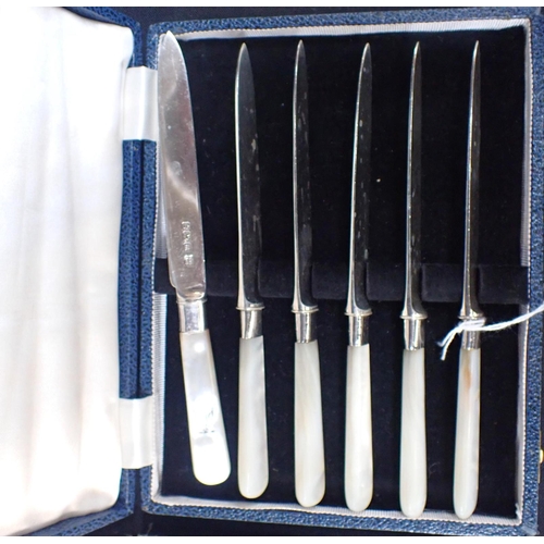 454 - A SET OF SIX SILVER FRUIT KNIVES AND FORKS with mother of pearl handles (in odd cases)