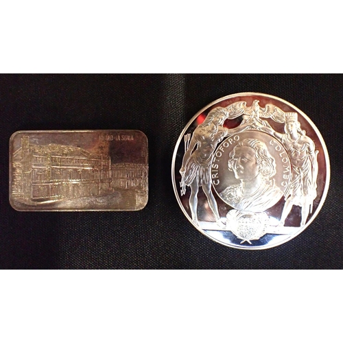 456 - AN ITALIAN SILVER INGOT, AND A SILVER MEDAL Boggiali, Milan 50g, and the medal depicting Christopher... 