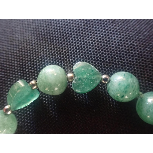 471 - AVENTURINE QUARTZ BEAD NECKLACE comprising a single row of aventurine quartz beads, interspersed by ... 