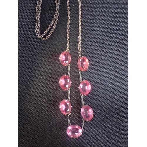 476 - A PINK PASTE NECKLACE AND BLUE GEMSTONE DROP EARRINGS the necklace in silver, set with seven oval cu... 