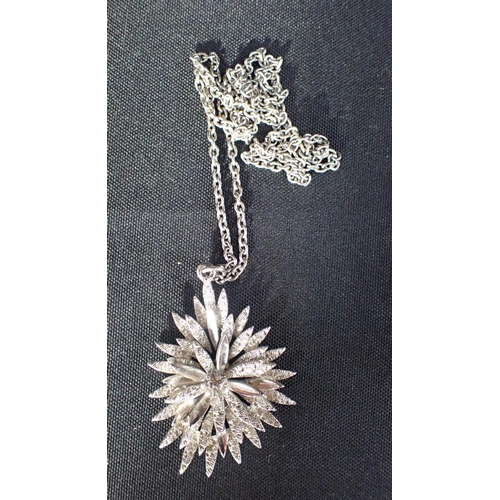 484 - A GEMSET THISTLE AND HEATHER BROOCH and a modernist flower pendant necklace