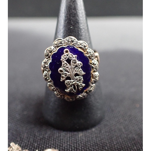 496 - AN ENAMEL AND MARCASITE MOURNING RING a St Christopher pendant necklace, and a purple paste dress ri... 