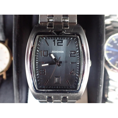 509 - FOUR QUARTZ WATCHES including three Sekonda watches and one Seiko watch