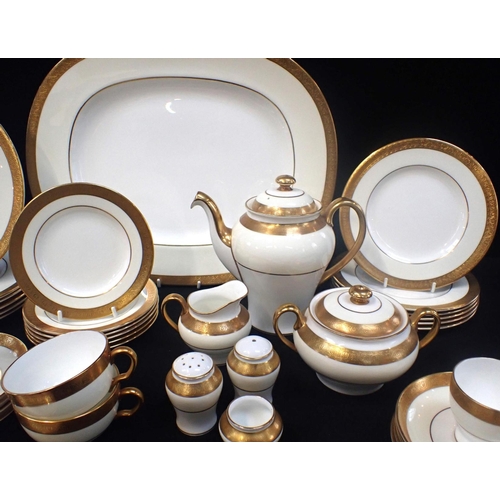 52 - MINTON BUCKINGHAM PATTERN DINNER SERVICE Including 4 coffee cups & saucers, 6 tea cups and saucers, ... 