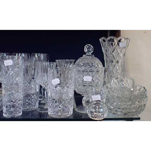 56 - A COLLECTION OF CRYSTAL GLASS including domestic glassware, decanters, dishes, rose bowls etc, some ... 