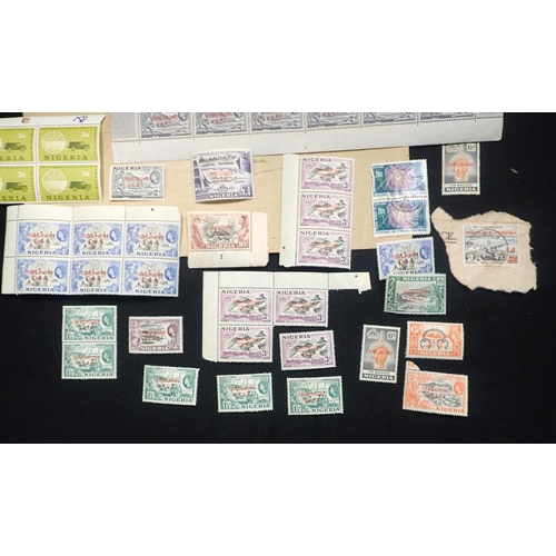 572 - A PART SHEET OF NIGERIA/ CAMEROON CANCELLED 2d STAMPS one £1 stamp, one 10/- stamp, and others, mint... 