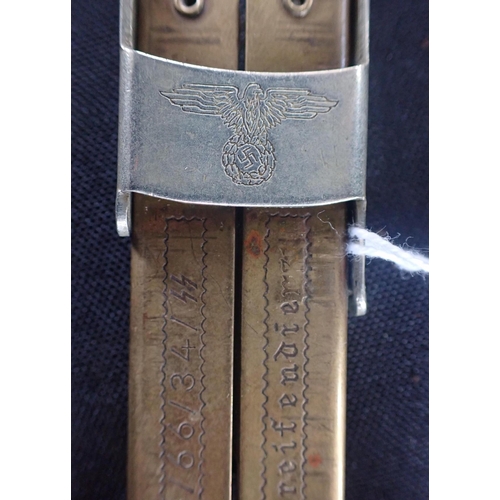 581 - A GERMAN FOLDING BRASS AND STEEL KNIFE with Solingen blade and the clasp with swastika and eagle