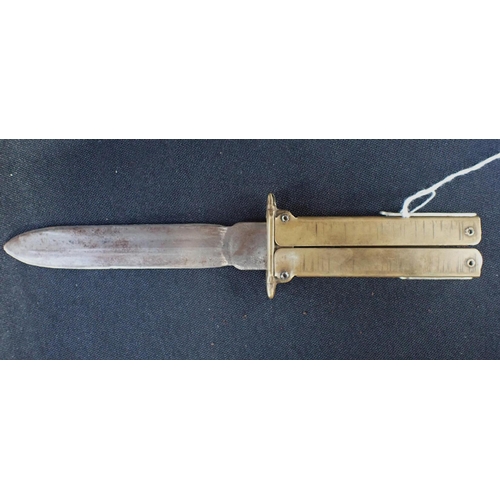 581 - A GERMAN FOLDING BRASS AND STEEL KNIFE with Solingen blade and the clasp with swastika and eagle