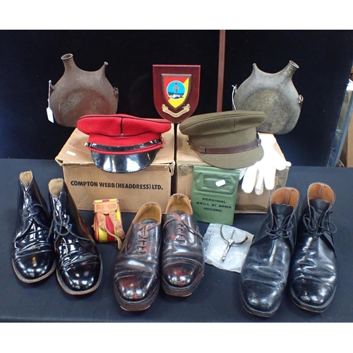 585 - A COLLECTION OF MILITARIA hats, boots, French WWI water bottles, etc