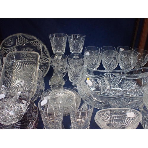 61 - A QUANTITY OF CUT GLASS including a pair of pickle dishes, Hock glasses, wine glasses, large bowls e... 